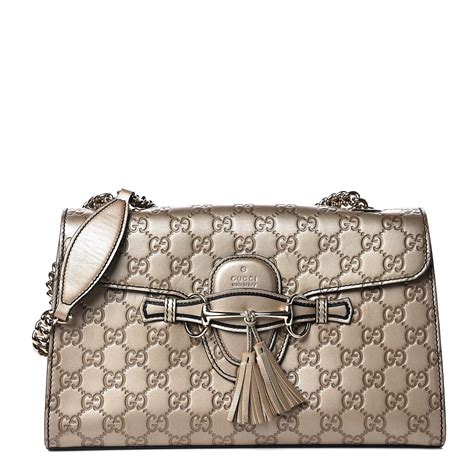 gucci clutch with gold chain|Gucci guccissima clutch.